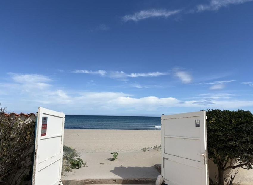 Aerial view showing beachfront location