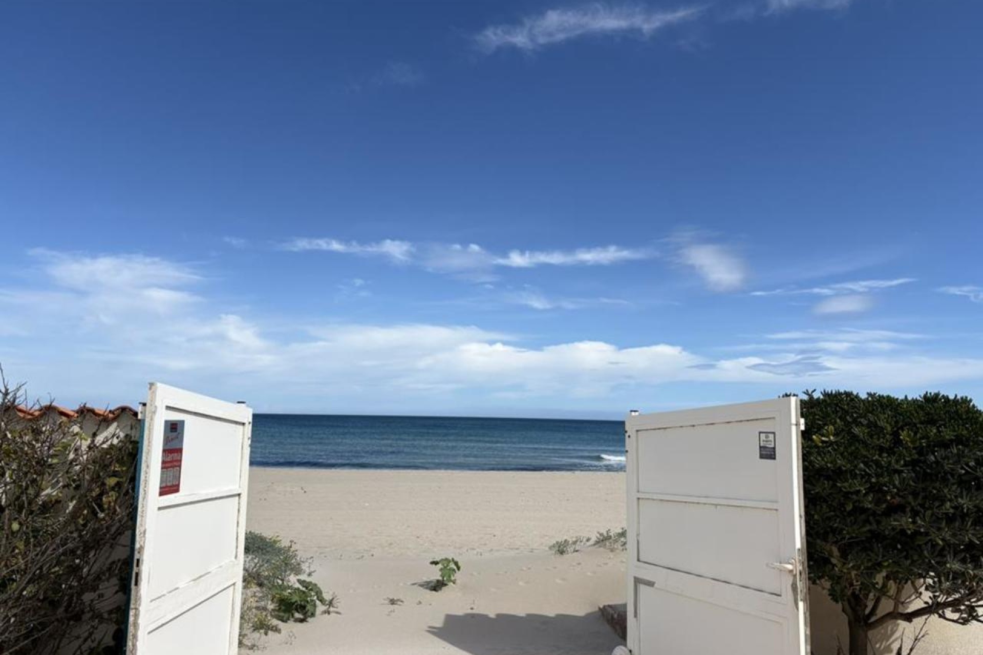 Aerial view showing beachfront location