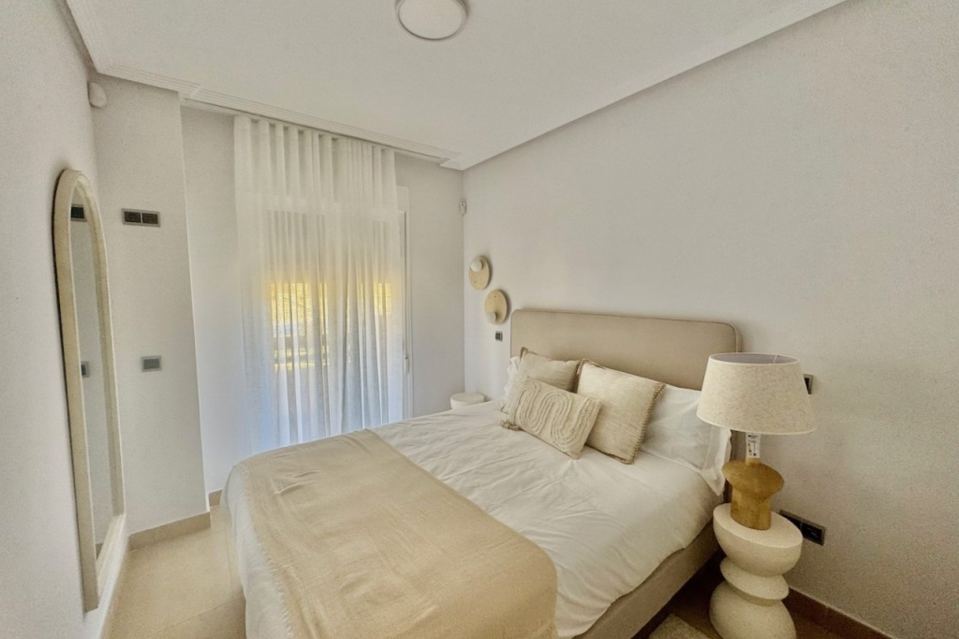 Cozy bedroom with modern neutral design