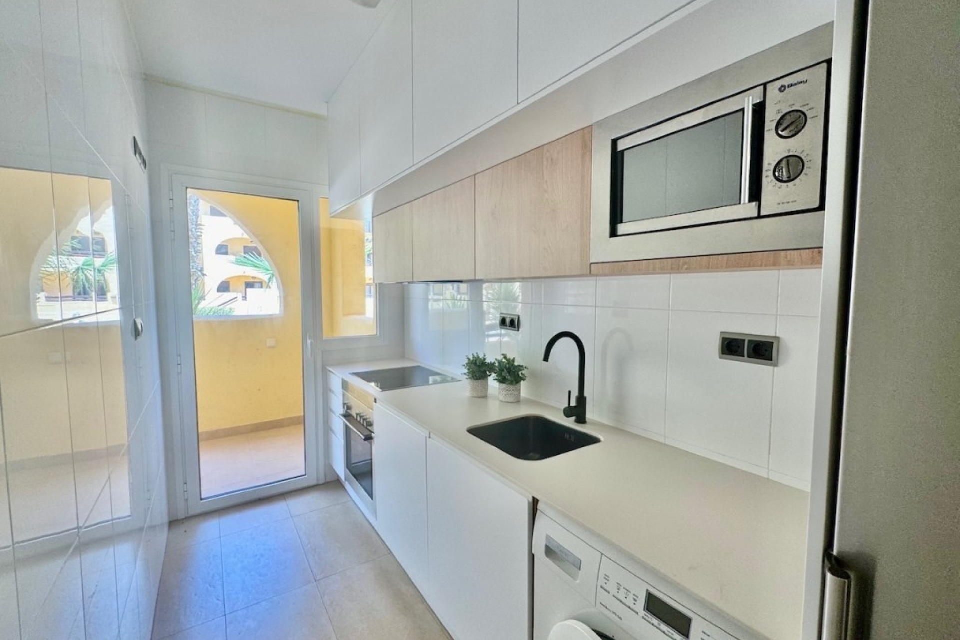 Cuisine moderne rénovée dans un appartement Serena Golf près du Mar Menor